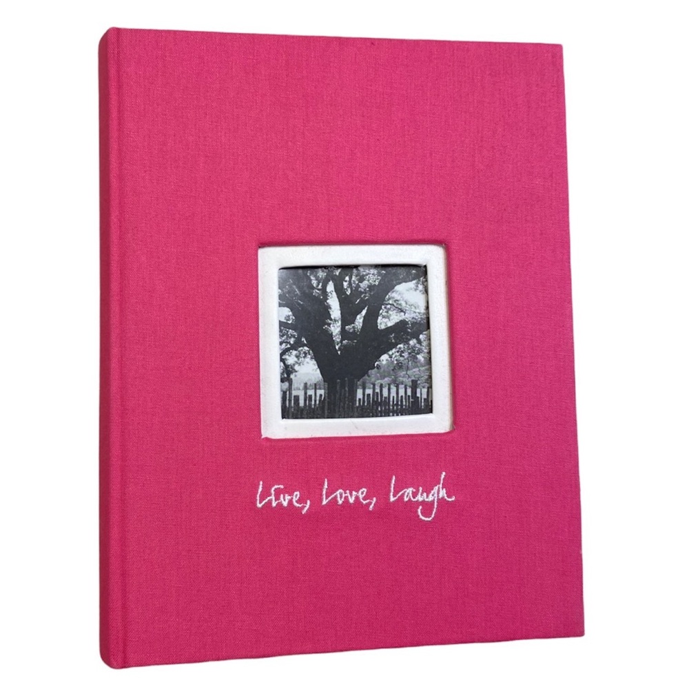 Photo album. Pink. Holds up to 160 photos. Like new. Live love laugh.